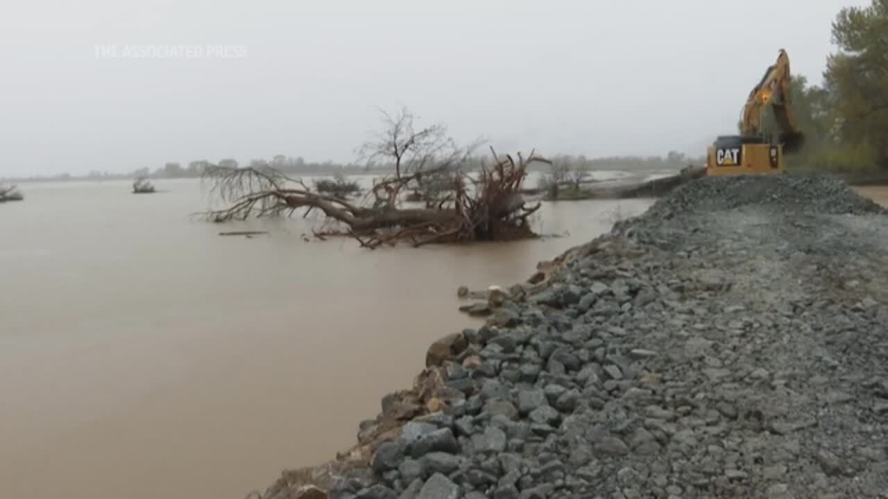 Crew races to fix California levee amid more rain